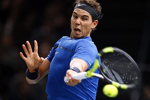 Rafael Nadal of Spain returns the ball to Hyeon Chung of South Korea during the Paris Masters tennis tournament at the Bercy Arena in Paris, France, Wednesday, Nov. 1, 2017. | AP