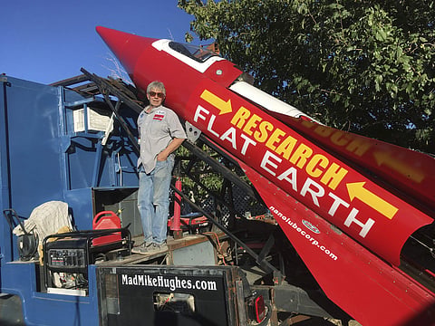 Mad Mike Hughes is shown with with his steam-powered rocket | AP