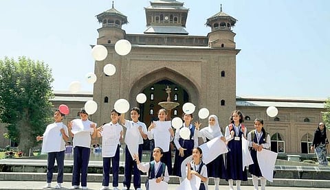 Students at a heritage site in Srinagar