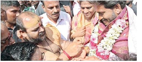 YS Jagan Mohan Reddy being felicitated at Pattikonda in Kurnool on Thursday during his Praja Sankalpa Yatra | Express