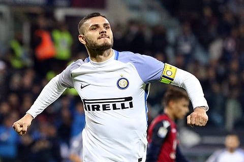 Inter Milan's Mauro Icardi celebrates after scoring during the Serie A soccer match between Cagliari and Inter Milan at the Sardegna Arena Stadium in Cagliari, Italy on Sunday. | AP