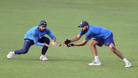 Murali Vijay and Rohit Sharma during a training session.|PTI
