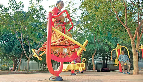 60-year-old Sharadamma, a housewife, works out at an open gym in Sanjaynagar. Her cross-training routine inspires many others, including youngsters, to follow suit Vinod Kumar T