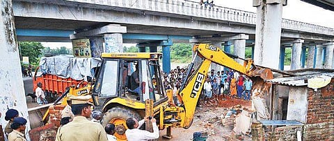 An illegal building being pulled down on Monday | Sunish P Surendran