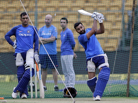 Indian cricket player Rohit Sharma bats during a practice session. (Photo | AP)