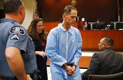 Scott Ostrem, 47, center, leaves a hearing in Adams County, Colo., court Friday, Nov. 3, 2017, in Brighton, Colo. | AP