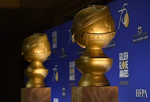 Golden Globe statues appear on stage prior to the nominations for 75th Annual Golden Globe Awards at the Beverly Hilton hotel on Monday, Dec. 11, 2017, in Beverly Hills, California. (AP)
