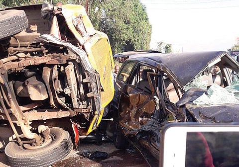 The mangled remains of the vehicles involved in the collision at Irumpanam toll plaza