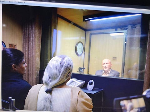 Kulbhushan Jadhav’s mother and wife meet the former Indian naval officer in Islamabad at the Pakistan foreign ministry. (ANI/Twitter)