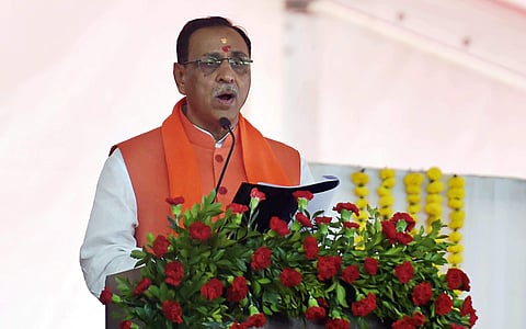 Vijay Rupani takes oath as Gujarat Chief Minister during the swearing-in ceremony at Gandhinagar Ahmedabad on Tuesday. (PTI)