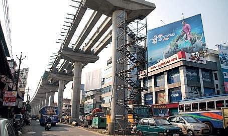 (Top)Under construction Kochi Metro Rail station at Vyttila Mobility Hub. (Above) The metro pillars near Vyttila K Shijith