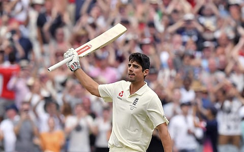 England's Alastair Cook celebrates making 200 runs against Australia during the third day of their Ashes cricket test match in Melbourne, Australia, Thursday, Dec. 28, 2017. (AP)