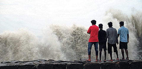 Though cyclone Ockhi has submerged roads and houses, people still spend time on beaches. A scene from Edavanakkad beach | K Shijith