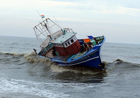 For representational purpose. Rough sea at Kerala's Puthiyappa Kozhikode, fishermen hanging on to the boat which lost control in the heavy winds and waves after Cyclone Ockhi hit off Puthiyappa coast in Kozhikode on Friday.(Photo: EPS/A Sanesh)