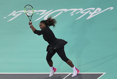 Serena Williams from the U.S. returns the ball to Jelena Ostapenko of Latvia during the final day of the Mubadala World Tennis Championship in Abu Dhabi, United Arab Emirates, Saturday, Dec. 30, 2017. | AP