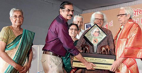Adoor Gopalakrishnan presenting the Balamani Amma Award to writer K L Mohanavarma in Kochi on Tuesday