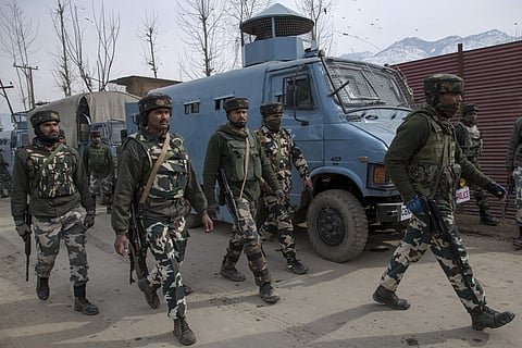 Indian paramilitary soldiers leave the site of a gun battle with suspected rebels in Hajin Village some 38 kilometers (23.75 miles) northeast of Srinagar, Indian controlled Kashmir, Tuesday, Feb. 14, 2017. | AP