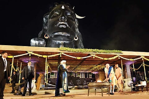 Prime Minister Narendra Modi and the Sadhguru at the Isha Foundation in Coimbatore on Friday, where he consecrated a 112-foot-tall statue of the Adiyogi (in the backdrop), to mark Maha Shivratri