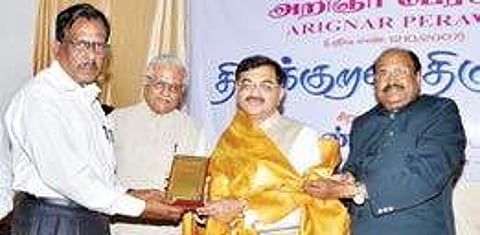 Former Rajya Sabha MP Tarun Vijay being presented the Tirukkural Tilagam award by Arignar Peravai president Prof Velusamy and its secretary Dr M Michael Faraday, in Chennai on Friday