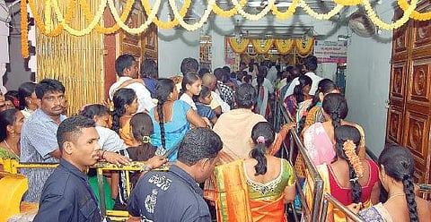 A large number of devotees waiting for darshan at Arasavalli temple | EXPRESS