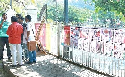 The cartoons on display at the Subhash Park fence