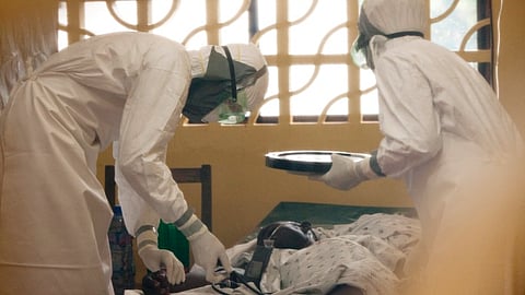 A file photo of doctors treating an Ebola victim (AP)