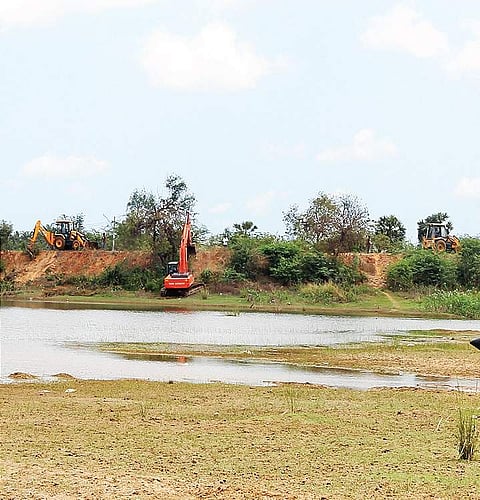 Manimangalam lake in Kancheepuram, where work was initiated under the Kudimaramath Scheme on Monday