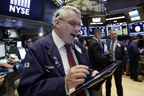Trader Frank O'Connell works on the floor of the New York Stock Exchange, March 16, 2017. AP