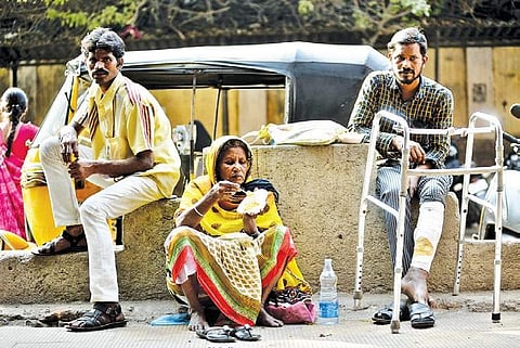 File photo of a patient waiting outside Osmania Hospital