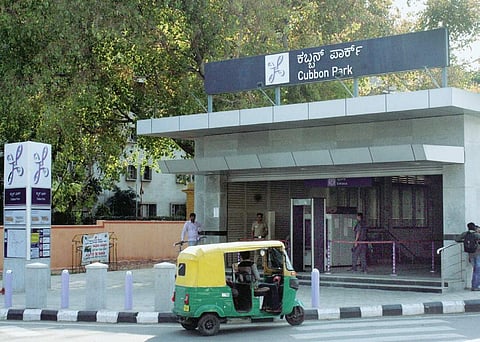 An auto waiting outside the Cubbon Park Metro station S Manjunath