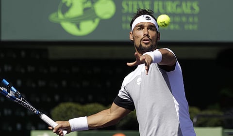 Fabio Fognini, of Italy, returns the ball to Kei Nishikori, of Japan, during the Miami Open tennis tournament, Wednesday, March 29, 2017, in Key Biscayne, Fla. | AP