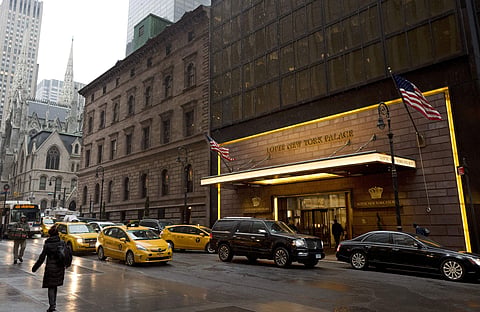 Traffic passes St. Patrick's Cathedral, left, and the Lotte New York Palace Hotel, in New York. (File Photo | AP)