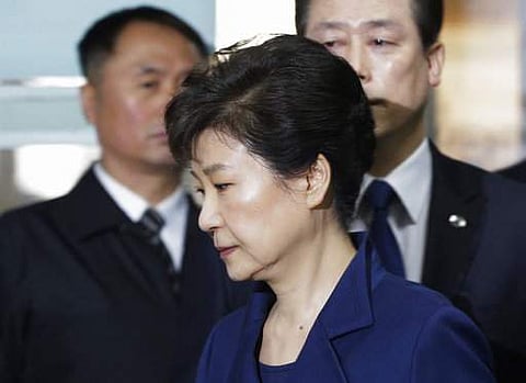 Ousted South Korean President Park Geun-hye arrives at the Seoul Central District Court for hearing on a prosecutors' request for her arrest for corruption, in Seoul on March 30. (File | AP)