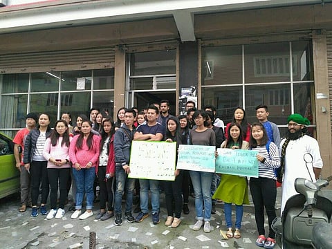 Sikkim University students hold a protest rally against the tourist hub at Tiger Hill in Darjeeling district of West Bengal. | EPS