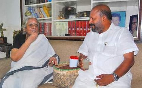 Poet Sugathakumari was presented with rice harvested from the fields where the Aranmula Airport project was to come up Manu R Mavelil