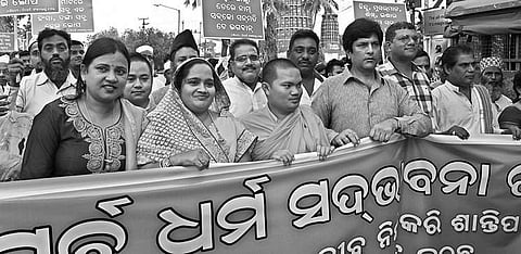 Members of BJD Minority cell taking out a peace rally over Bhadrak riots in Bhubaneswar on Tuesday | Express