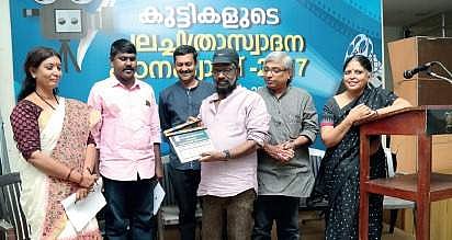 KSFDC chairman Lenin Rajendran inaugurates the children's film camp. Camp director V. S Bindhu, Arun Gopi, KSCA secretary Mahesh Panju, KSCA chairman Kamal and chairperson Bina Paul are also present
