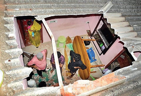The roof of the house, which gave way to a falling elephant calf, at Kolipalam, Gudalur, on Thursday | Express