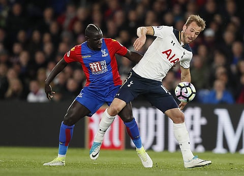 Tottenham's Harry Kane, right, vies for the ball with Crystal Palace's Mamadou Sakho during the English Premier League soccer match between Crystal Palace and Tottenham Hotspur at Selhurst Park stadium in London. | AP