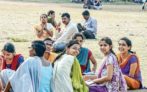 Students doing last-minute revision before appearing for the JEE Mains 2017 at an examination centre in Vijayawada on Sunday | Express