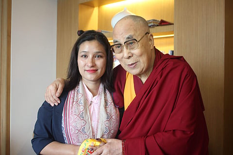 The Dalai Lama with Everester Anshu Jamsenpa at Guwahati on Tuesday. | Express Photo Service