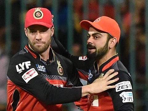 A B de Villiers (L) and Virat Kohli (File | PTI)