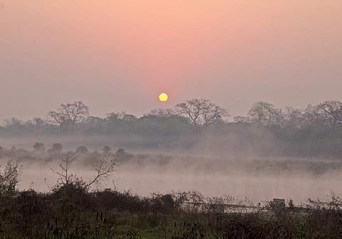 Sunrise and a misty river