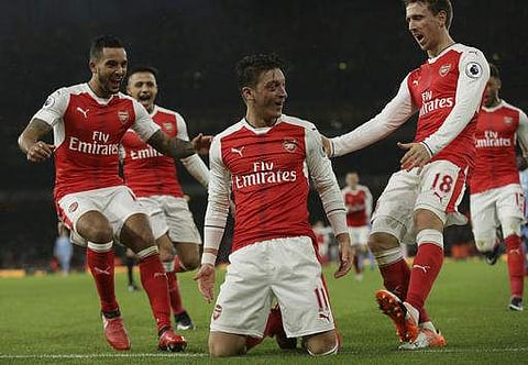 Usmanov owns 30 per cent of Arsenal and is said to have recently made the offer in a letter to Kroenke, who controls a 67 per cent stake. | AP