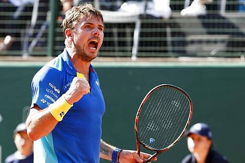 Stanislas 'Stan' Wawrinka of Switzerland celebrates a point against Mischa Zverev of Germany during the final match at the Geneva Open tennis tournament. | AP