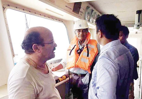 MMD officers aboard the cargo ship Amber L, anchored in Kochi, as part of an inquiry on Monday