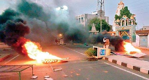 Public property set ablaze in Mandsaur, Madhya Pradesh, after six farmers were killed in a shooting incident | Fila photo by PTI