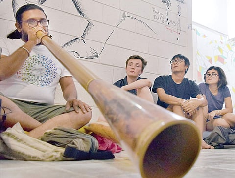 Abhijith Bhat playing didgeridoo Jithendra M