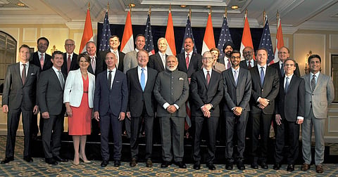 Prime Minister Narendra Modi pose for a group photograph with US business leaders at a meeting in Washington DC USA on Sunday. (Photo | PTI)
