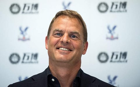 Former Dutch international great Frank de Boer speaks at a press conference as he is unveiled as the new manager of Crystal Palace Football Club in London. | AFP